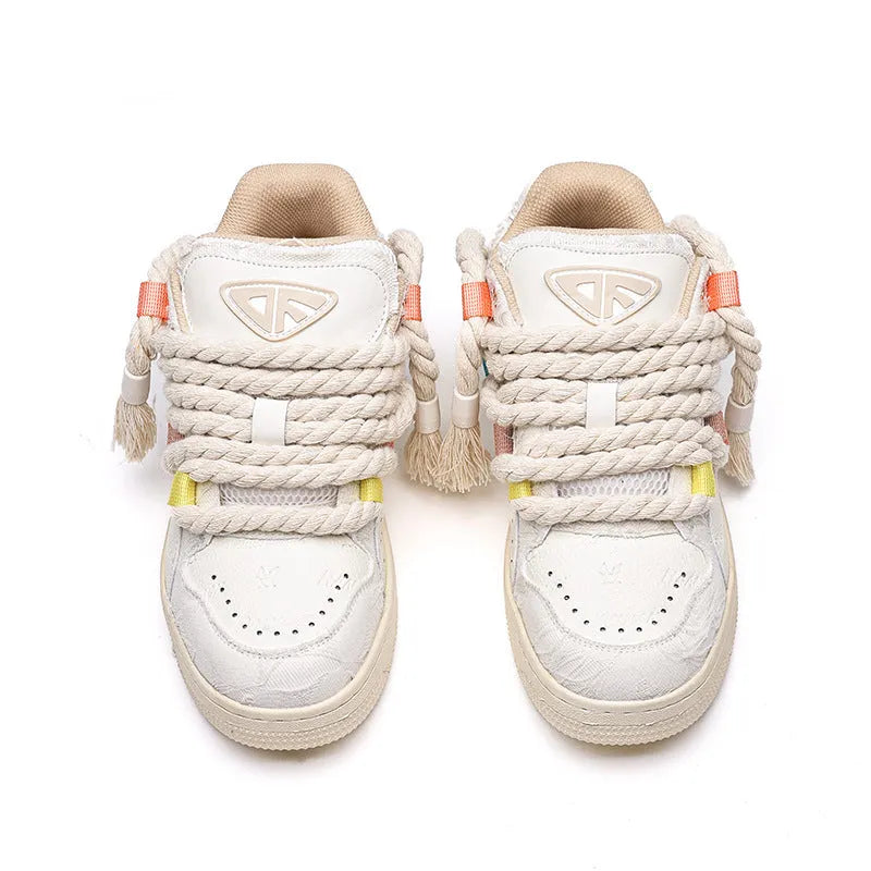 Creamy white retro skateboard shoes with old damage lace detailing and platform rubber sole