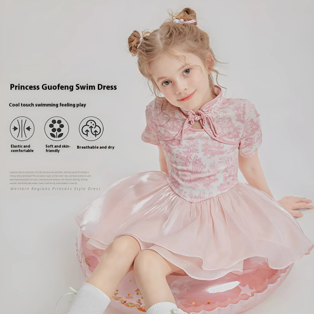 Children's casual patchwork swim shorts two-piece set with short sleeves on a neutral background.