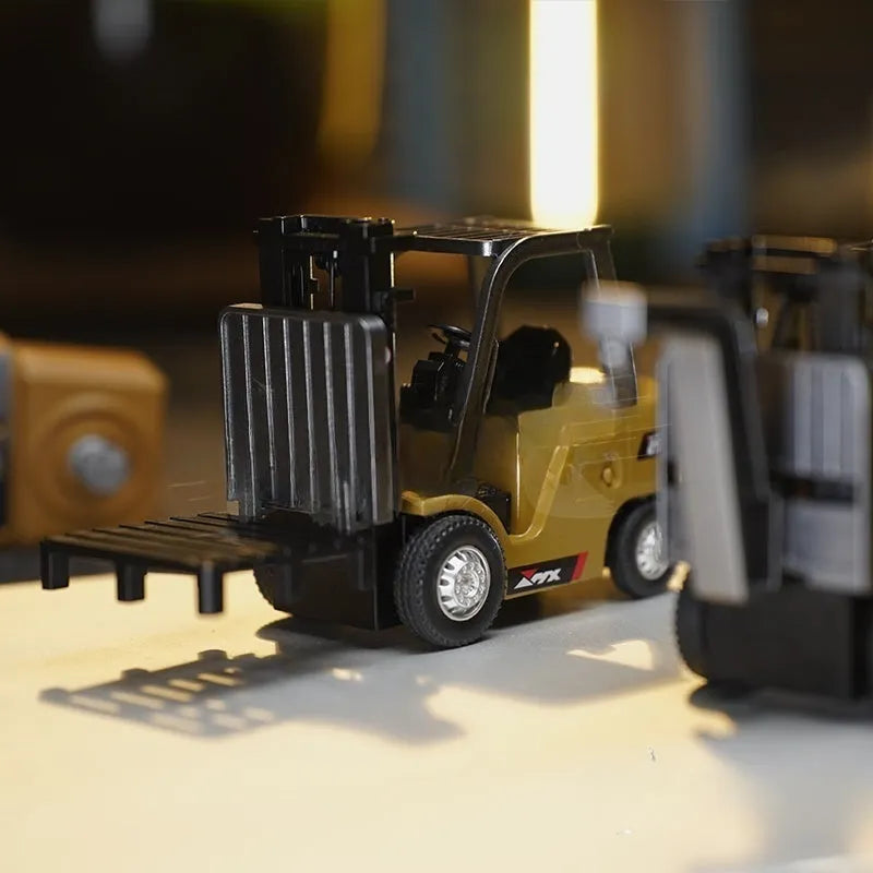 Alloy remote control engineering vehicle toy with mobile phone control, available as forklift, excavator or dumptruck for ages 7 to 14