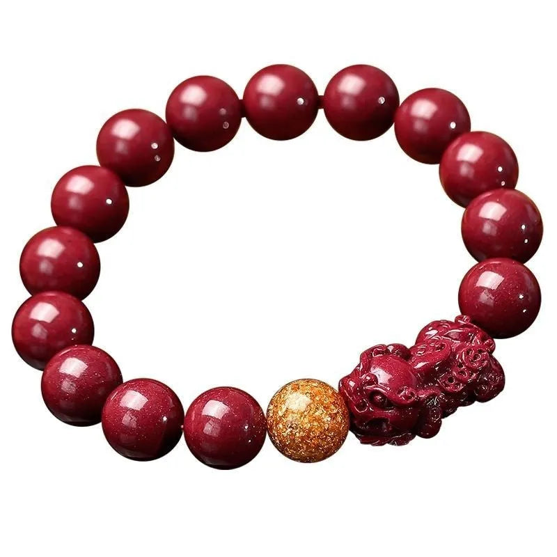 Purple gold sandstone cinnabar bracelet with polished beads and Year of Fate symbolism.