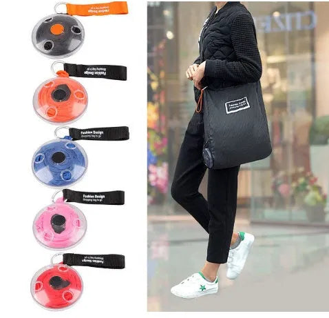 Disc folding portable shopping bag in red unfolded showing 33x40x10cm size with compact 10.5cm disc beside it