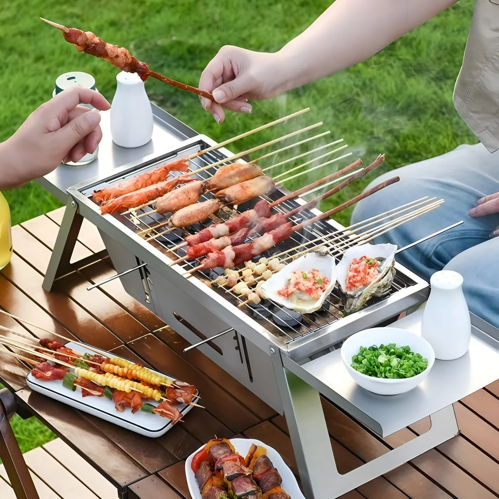 Small foldable portable charcoal grill for outdoor cooking
