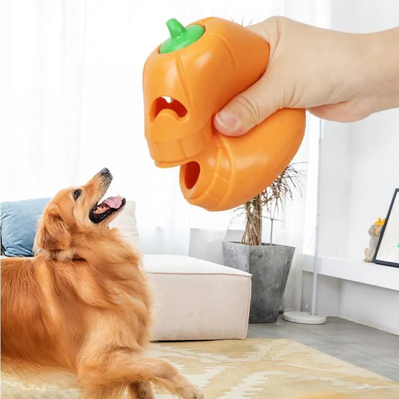 Yellow pumpkin-shaped TPR dog chew toy for aggressive chewers, showing textured ridges.