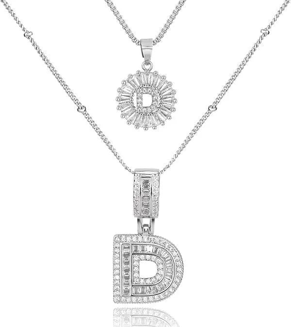 26 English letters copper-plated gold diamond initial pendant necklace with adjustable chain on display
