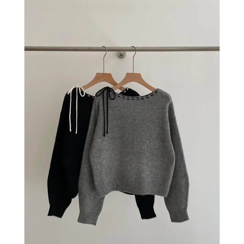Grey loose-fitting women's long sleeve pullover made from regenerated cellulose knitwear.