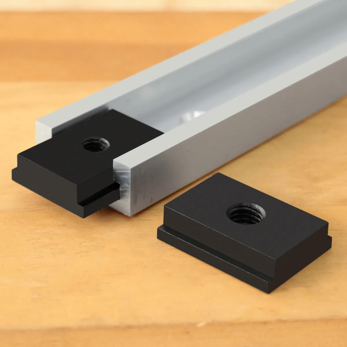 Aluminium alloy M6 and M8 sliding chute slider set for woodworking T-slot tracks in black, silver, blue, and red.