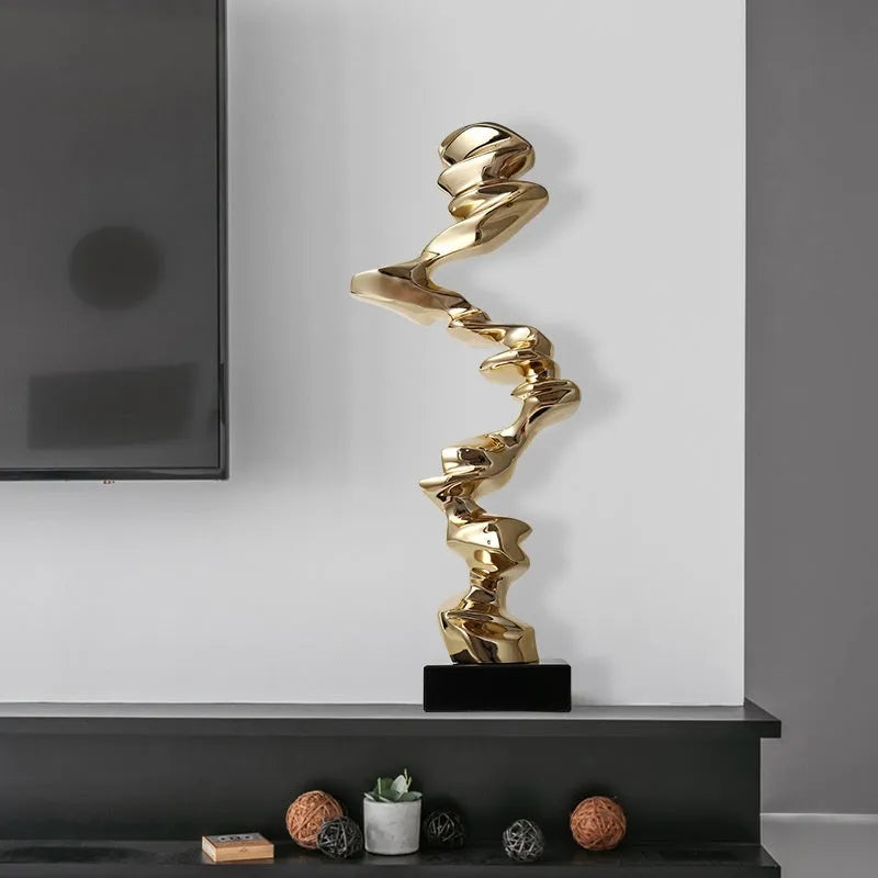 Abstract resin ornament in modern style with metallic finish for hallway or living room decoration