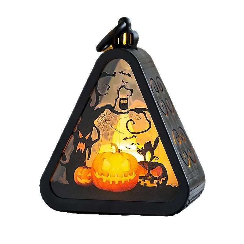 Small plastic Halloween pumpkin lamp decoration in choice of Castle, Ghost Hand, Pumpkin, or Witch design
