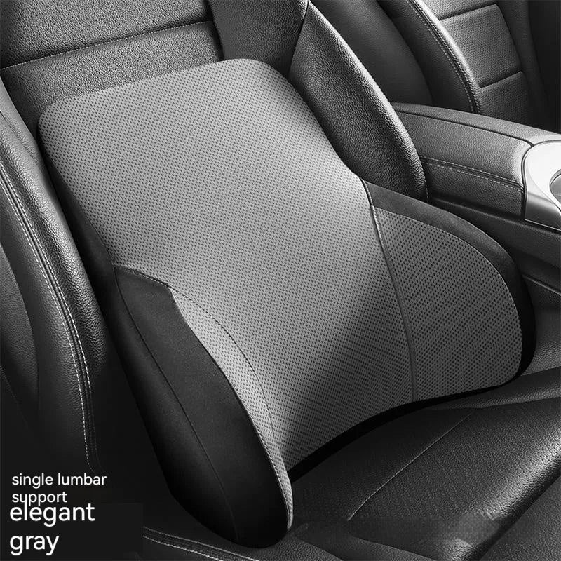 Black memory foam car headrest and lumbar support pillow set on a car seat