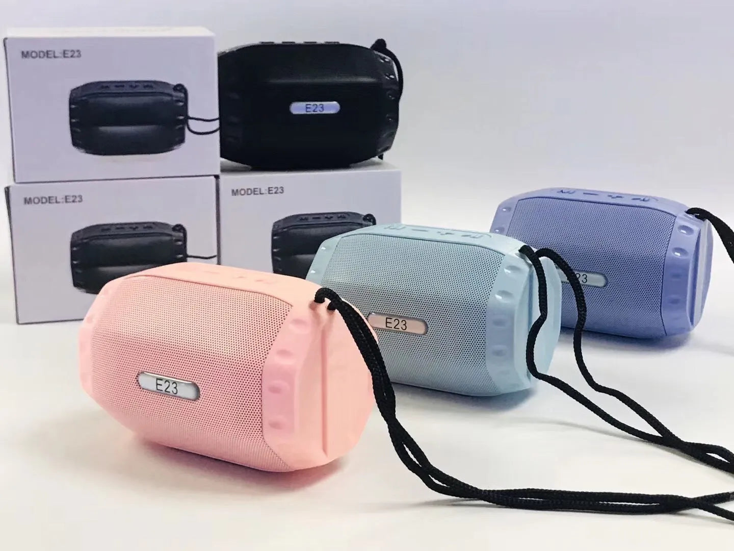 Wireless Bluetooth speaker with USB port in black, blue, pink, or purple colour options