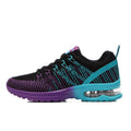 Women's casual lace-up sneakers in black with low heel and mesh lining