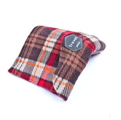 U-shaped neck support travel pillow that can also be worn as a scarf, shown in one of four available colours.