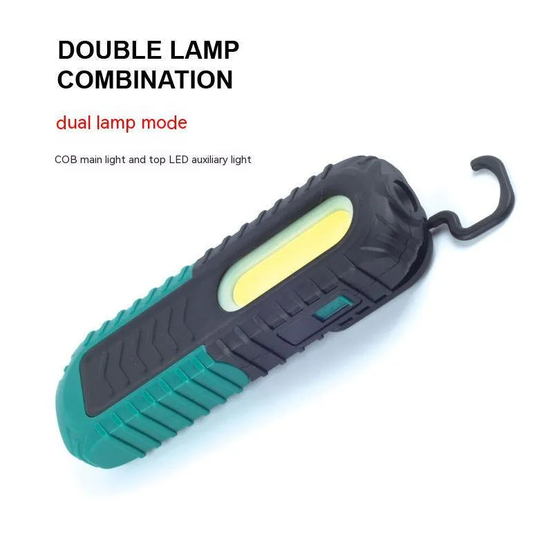 Black and green USB rechargeable auto inspection work light with drop-resistant coating.