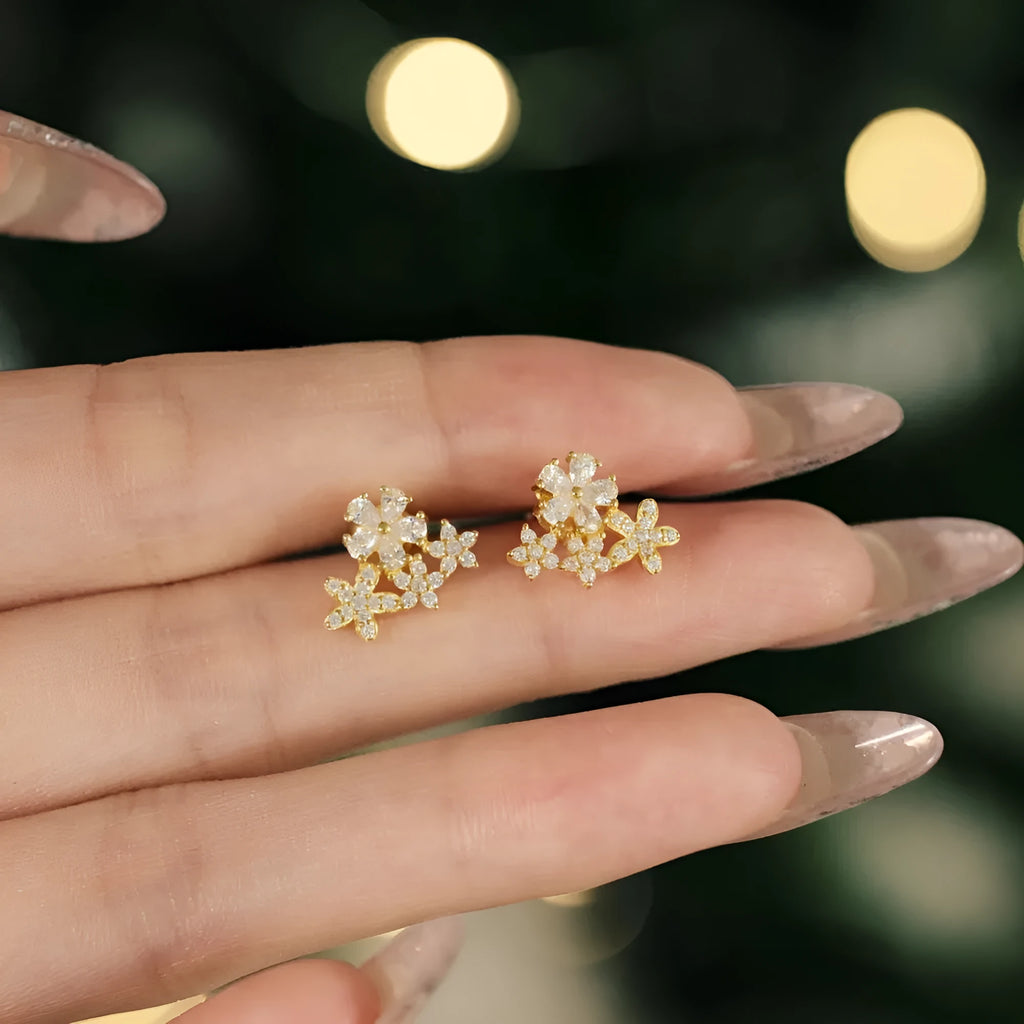 S925 sterling silver flower stud earrings with petal design in platinum and gold colour