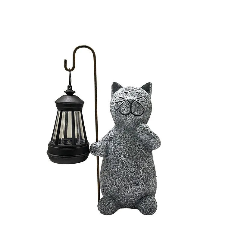 Resin cat lift solar garden lamp with pastoral design and integrated solar panel