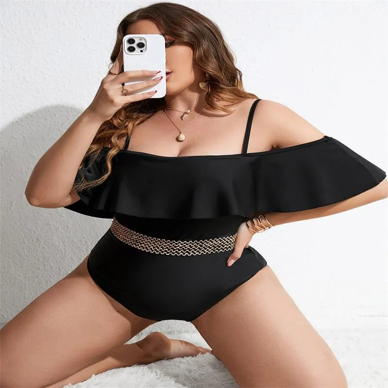 Black women's one-piece polyester swimsuit on a hanger