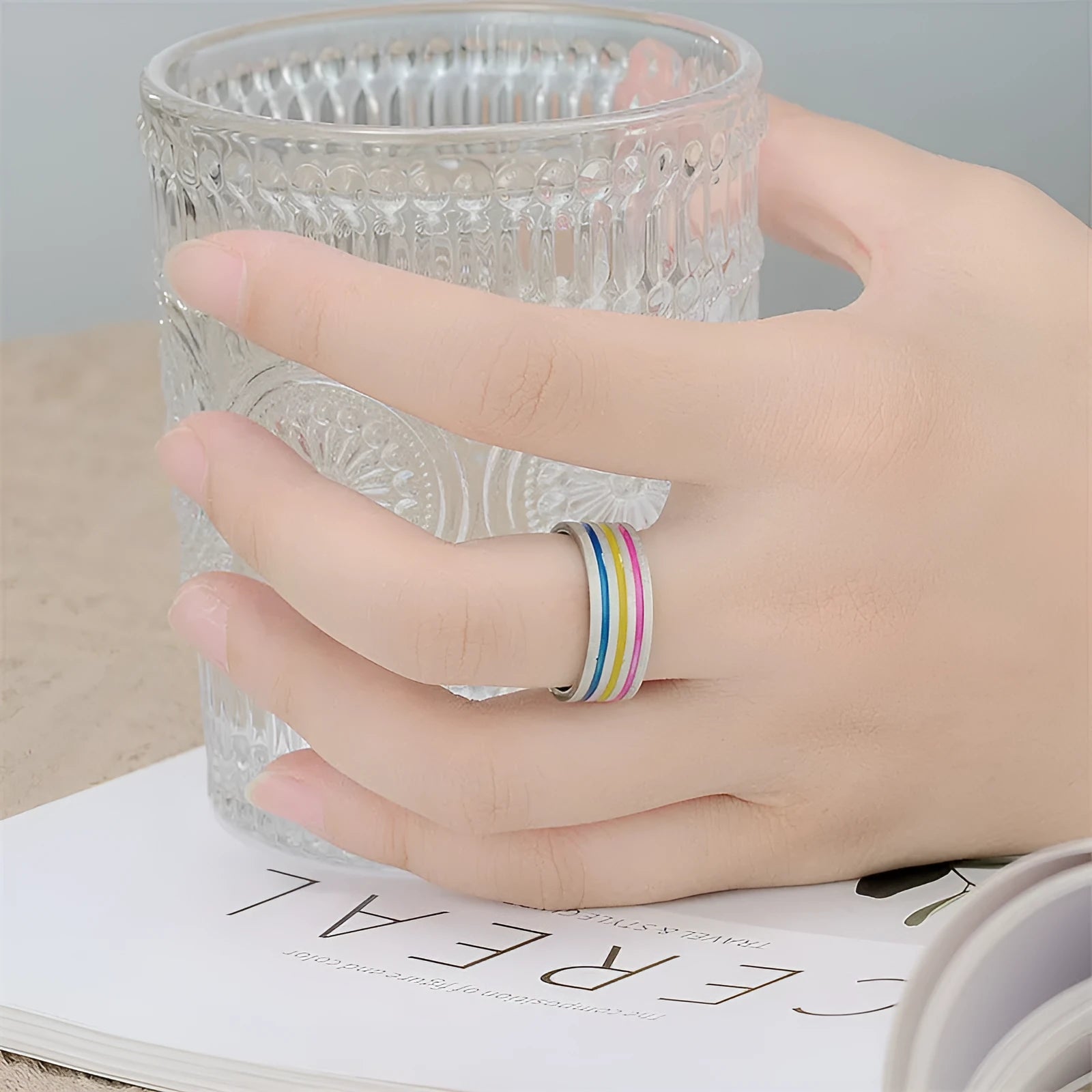 Titanium steel ring with rainbow drops of oil finish, flower shape, 8mm width, silver colour