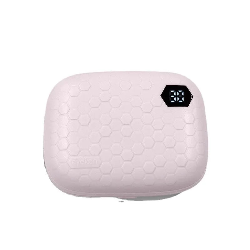Pearl white automatic ultrasonic flushing instrument for cleaning glasses on a table.
