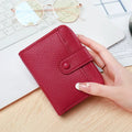Ladies' short wallet with lychee pattern in PU material showing 2-fold design