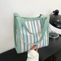 Women's large-capacity urban simplicity tote bag in blue, green, khaki, and pink with internal phone pocket and double shoulder straps