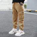 Boys' army green cotton casual trousers with long length, shown on a size chart