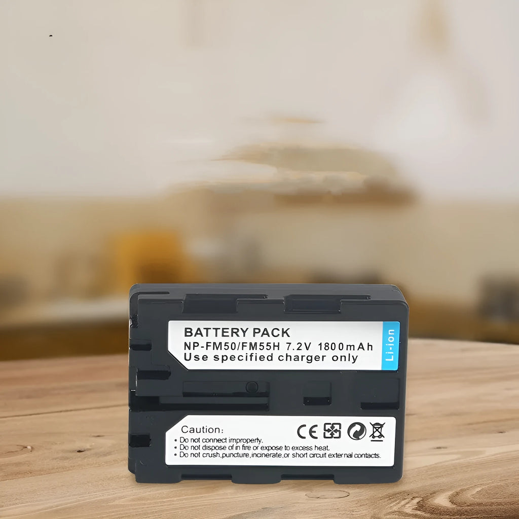 Black FM50 FM30 FM55H camera battery, 7.2V DC/DV replacement power pack with 8.4V charger input.