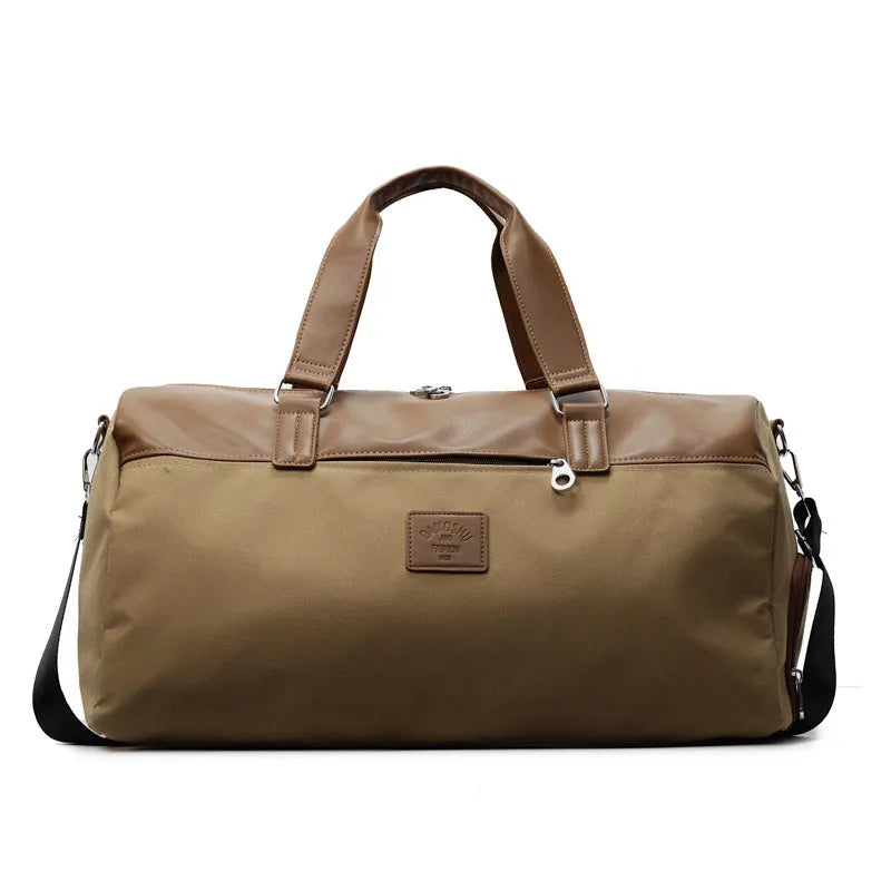 Black Oxford cloth large capacity messenger bag with a top handle and adjustable shoulder strap.