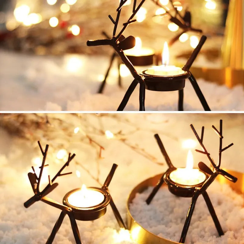 Black iron Christmas candlestick with decorative elk bracket and Santa Claus motifs