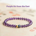 Retro mixed material bracelet with a detailed nine purple lotus design.