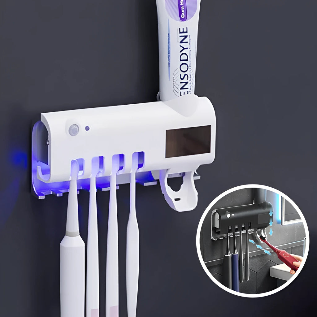 Black wall-mounted UV toothbrush steriliser with automatic toothpaste squeezer on bathroom tiles