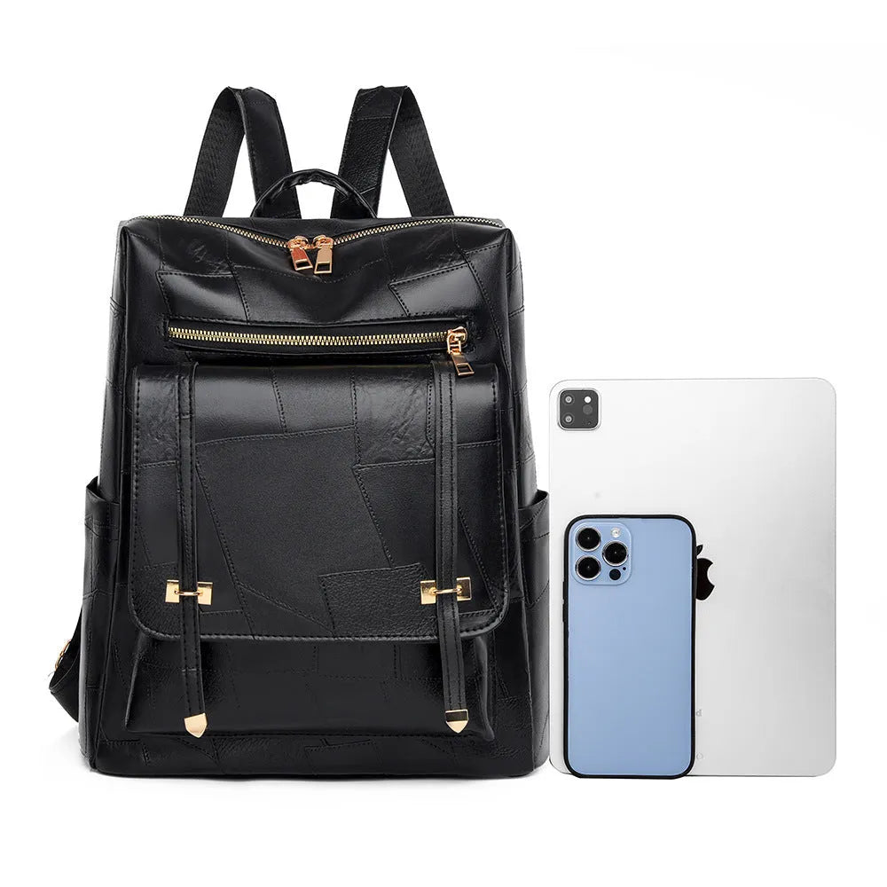 Retro brown PU leather women's backpack with front pockets and top handle.