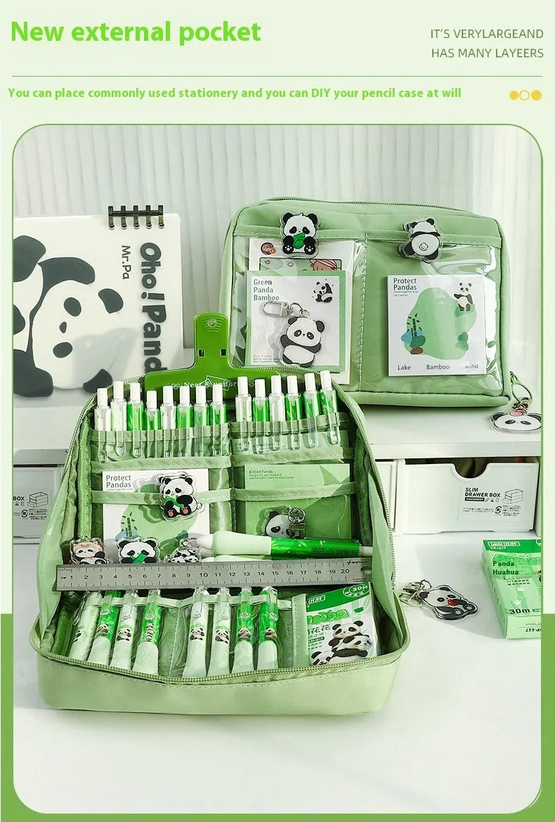 Green canvas pencil case with panda design featuring 12 internal layers for organising pens and stationery.