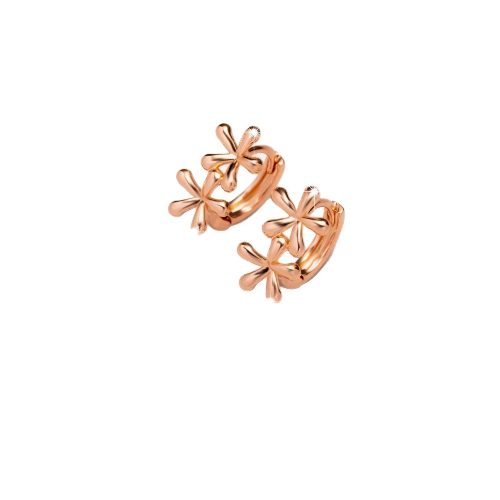 Rose gold electroplated earrings with a waterdrop shape and detailed floral petal etching on a white background.