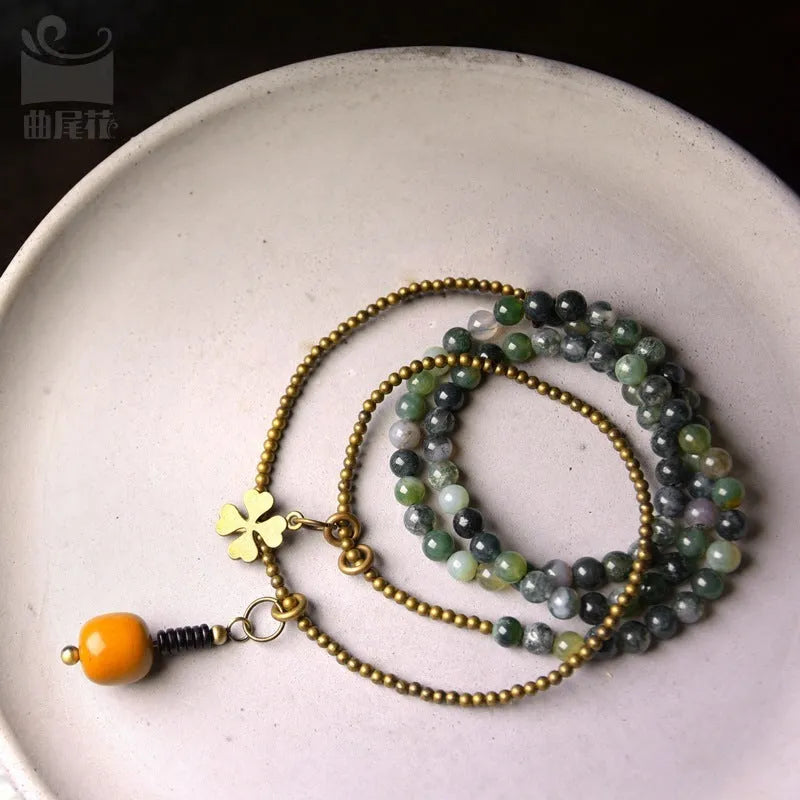 Ethnic multi-layered bracelet with natural crystals for children in traditional retro style