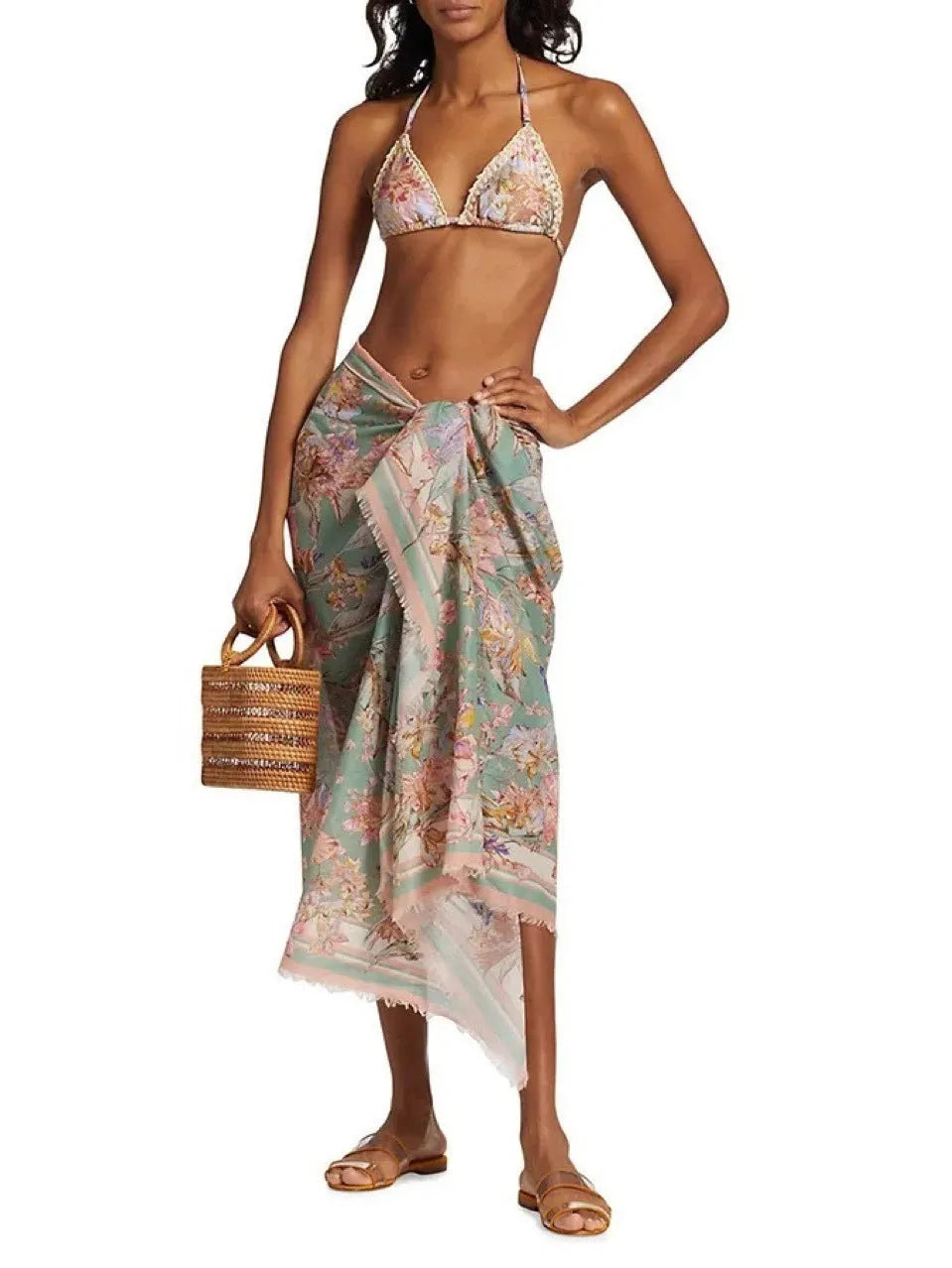Women's creamy-white floral nylon bikini set with detachable skirt shown in sizes S-XXL