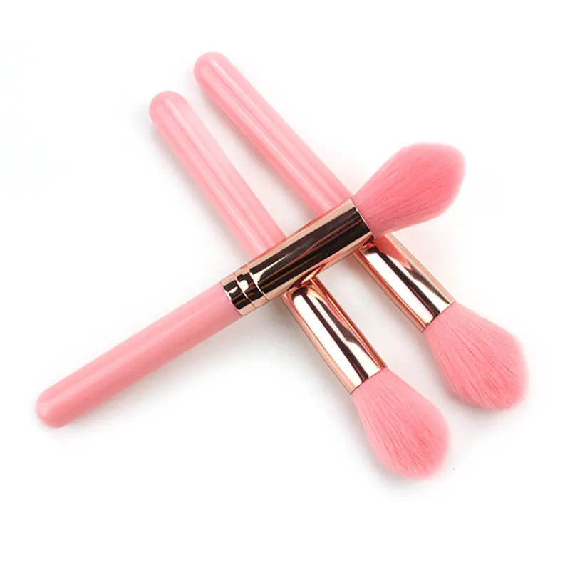 Pink blush brush with corrugated silk nylon wool bristles and plastic handle for highlight application