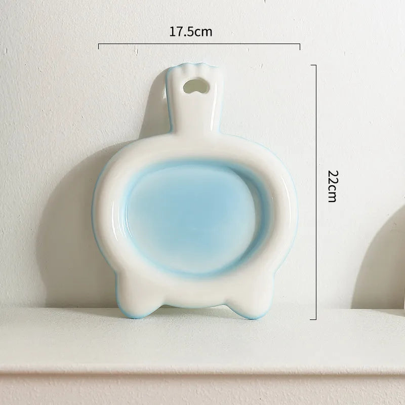 Ceramic cat bowl with shallow design and non-slip rubber base in blue, green, pink or yellow