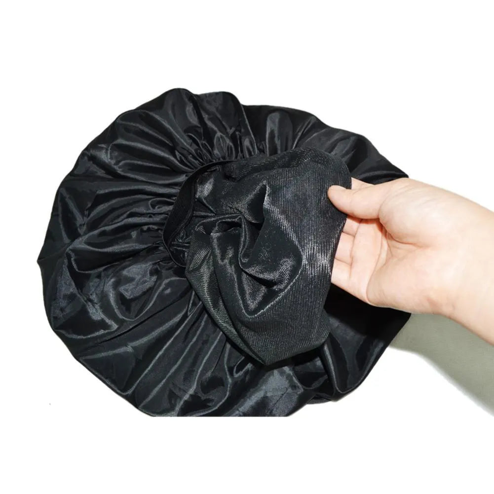 Black beauty salon cap with elastic circumference and 45cm diameter, warp all over lining and Chunya spinning outer layer