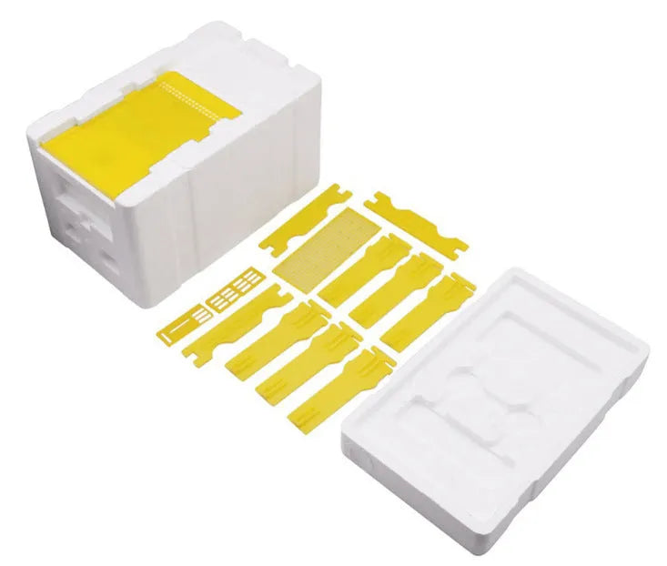 Three white EPS foam bee delivery boxes with hinged lids for queen bee mating and transport.
