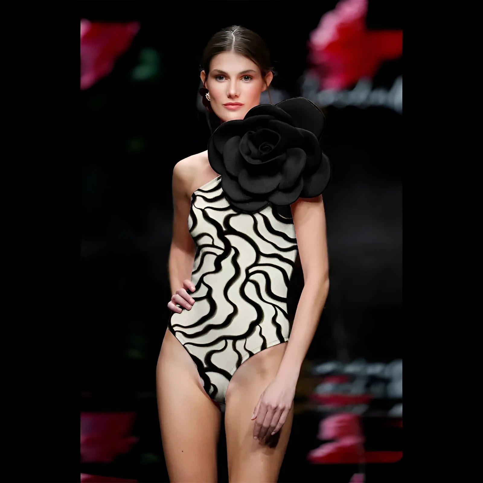 Women's solid colour one-piece swimsuit with European fit in a floral pattern design.