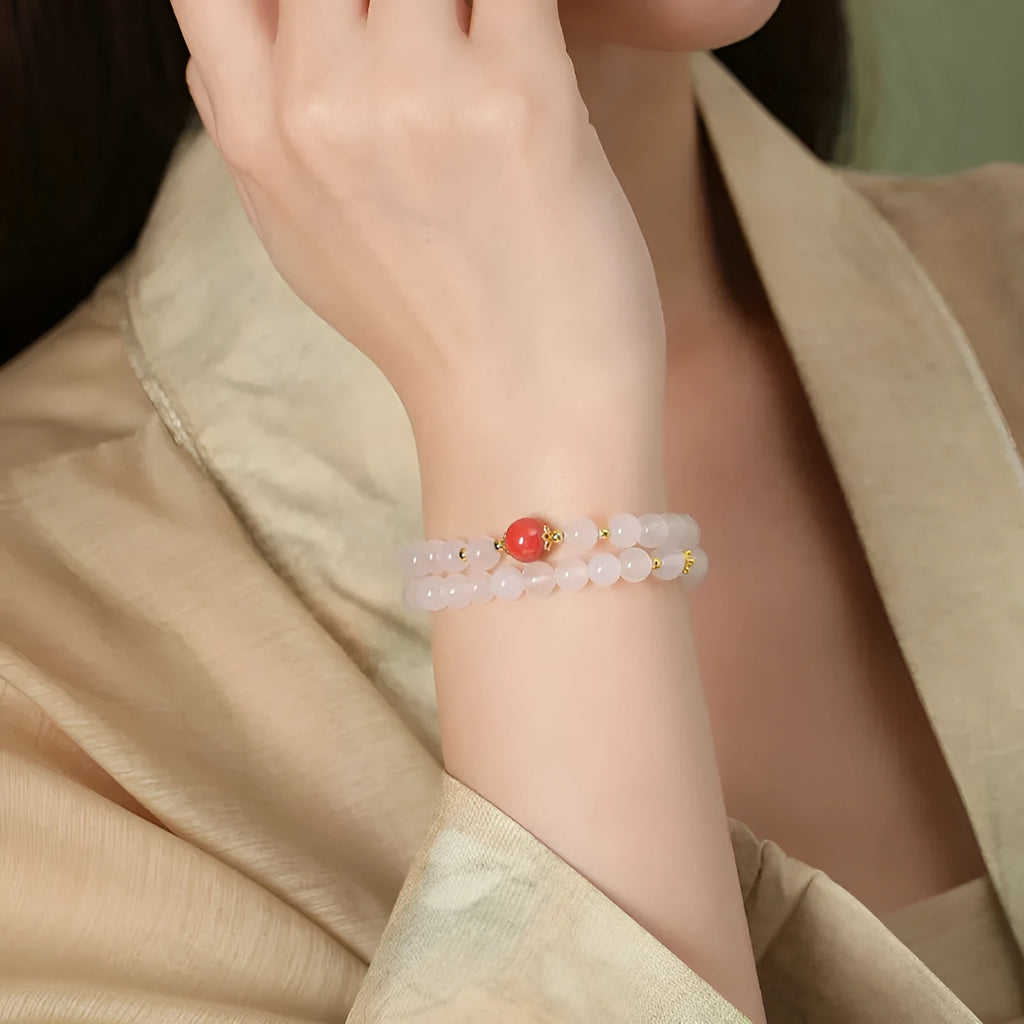 White agate women's bracelet with geometric design and Jequirity Bean Cinnabar detailing