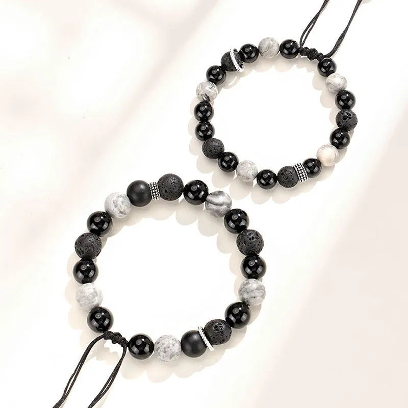 Black agate map stone and volcanic rock bracelet with diamond clasp in 8mm and 10mm sizes.