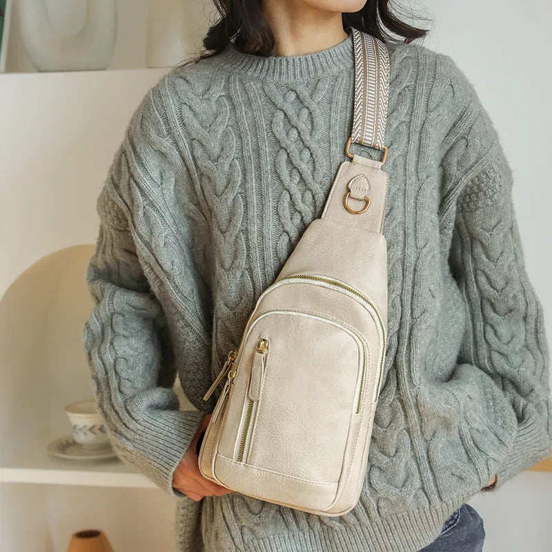 Women's soft brown PU messenger chest bag with crossbody strap and zip compartments.