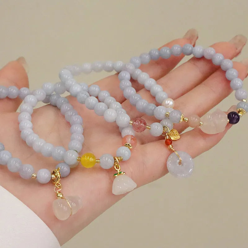 Aquamarine crystal bracelet with gold plated charm pendant for women