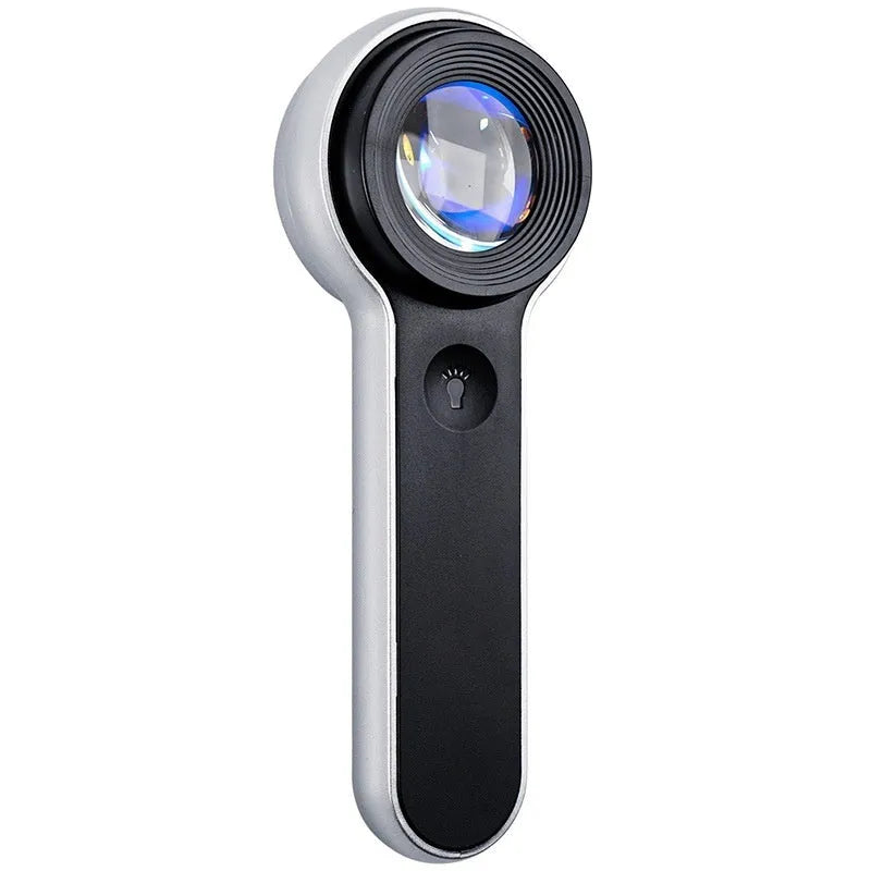 60x HD LED magnifying glass with USB charging in silver, showing illuminated lens and compact handheld design
