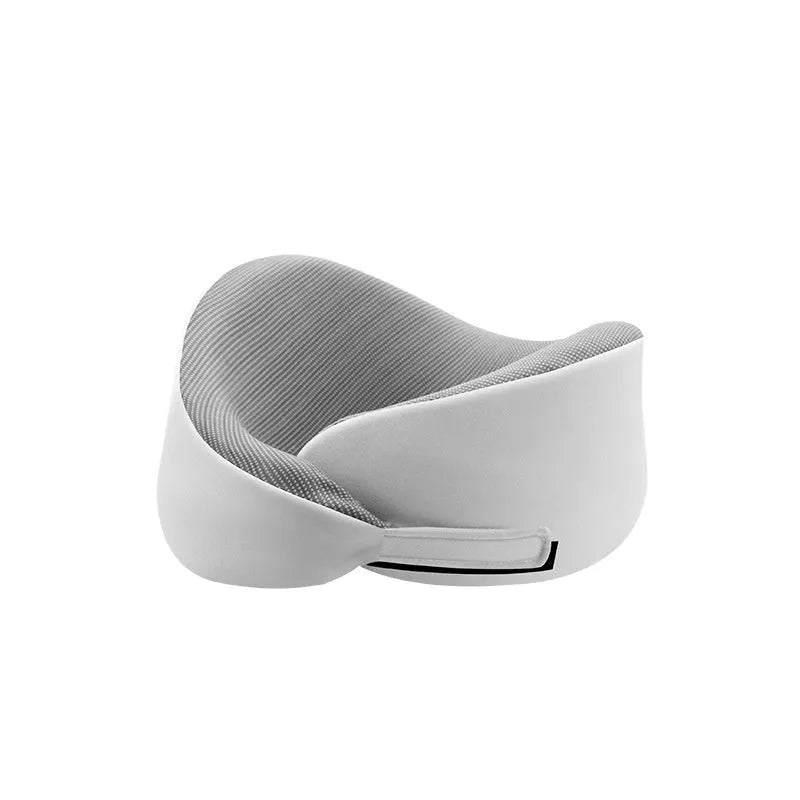 Light grey memory foam U-shaped neck pillow with a removable magnetic cloth cover