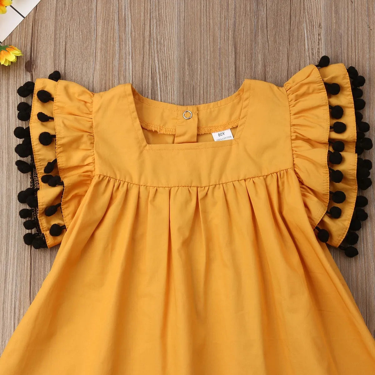 Orange sleeveless summer dress for girls available in sizes 12M through 5T