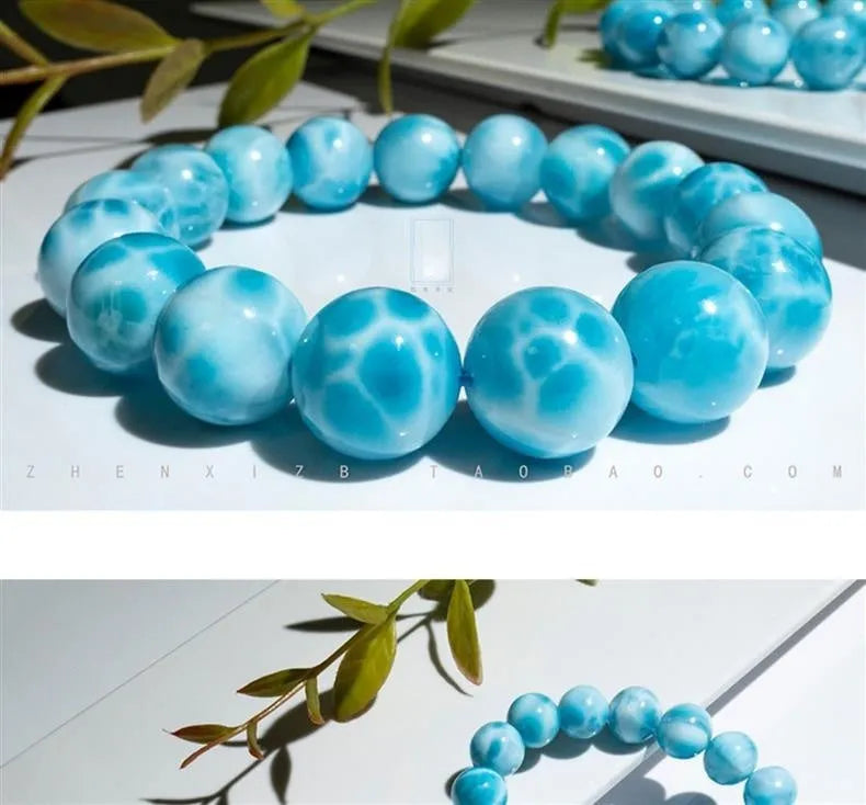Blue handcrafted Bodhi bracelet with pearl accents, showing different bead size options.