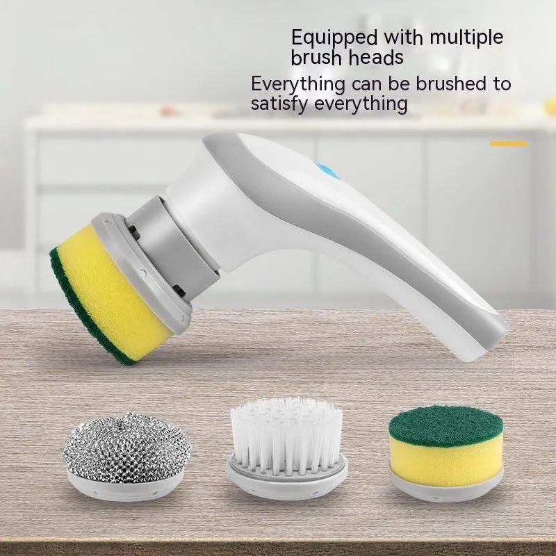 White cordless electric cleaning brush with multiple brush heads on charging dock