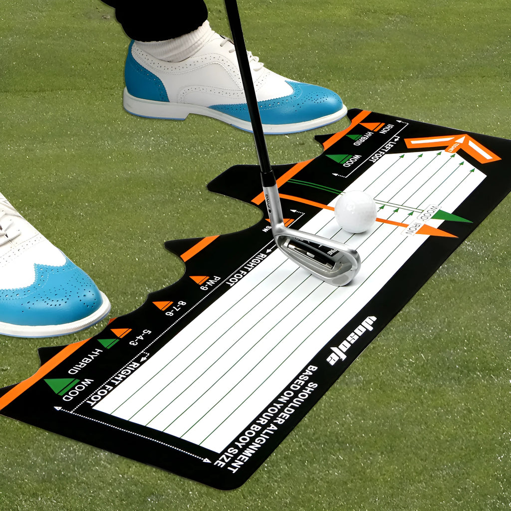 Black neoprene golf swing stance correction training pad on grass